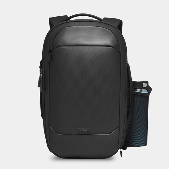 Gomatic Navigator RS Pack 15L Black Front View With Water bottle#color_black