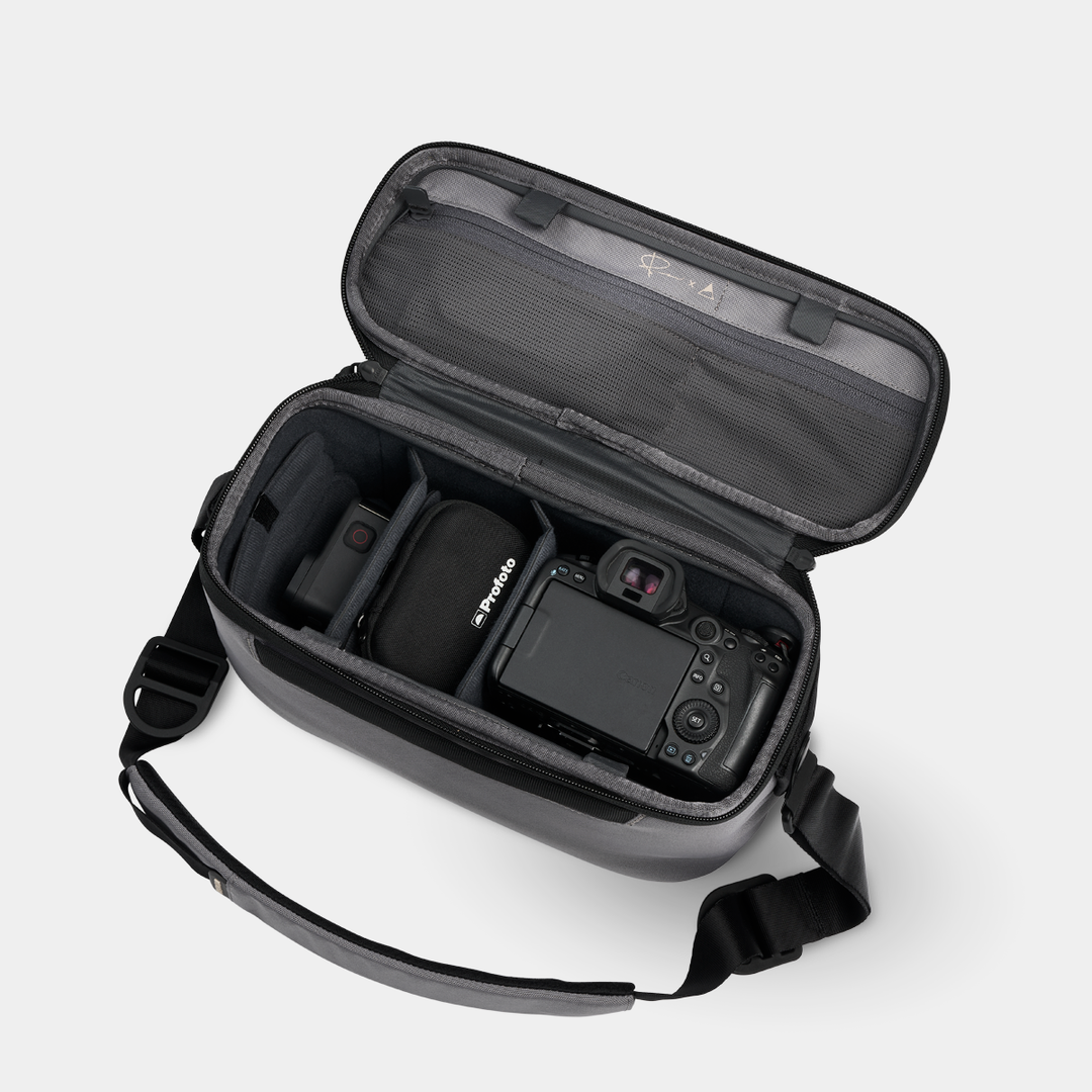 Stone Luma Camera Sling 12L With Items View #color_stone